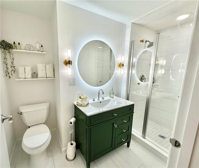 full bathroom featuring tile patterned flooring, toilet, a stall shower, and vanity