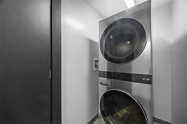 3080 Smallman St, Downtown Pgh, PA 15201 - washroom with stacked washer / dryer and baseboards