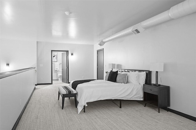 3080 Smallman St, Downtown Pgh, PA 15201 - carpeted bedroom with ensuite bath and baseboards