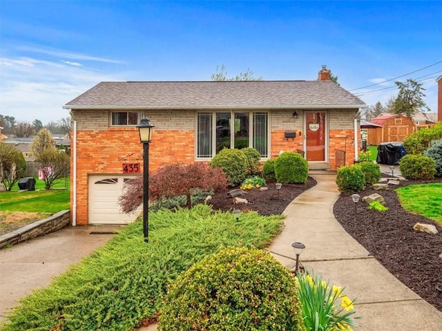435 Elaine Dr, Baldwin Boro, PA 15236 - single story home featuring an attached garage, a chimney, driveway, and brick siding