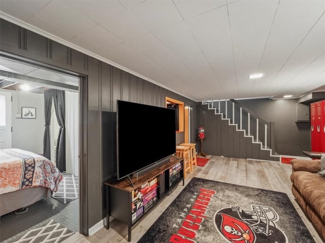 435 Elaine Dr, Baldwin Boro, PA 15236 - living area featuring stairway, ornamental molding, and wood finished floors