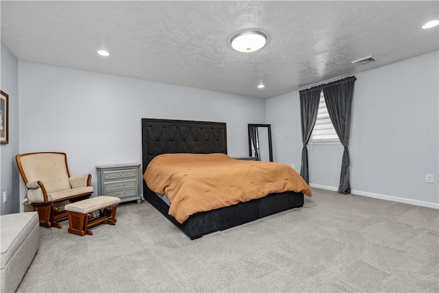 bedroom featuring recessed lighting, carpet, visible vents, and baseboards