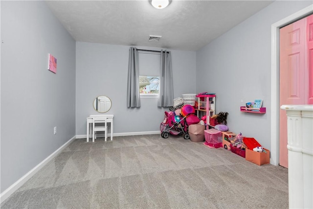 game room featuring visible vents, baseboards, and carpet