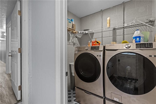 laundry area with washer and dryer
