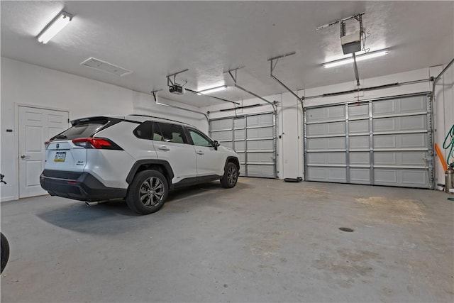 garage with a garage door opener