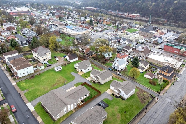birds eye view of property with a residential view