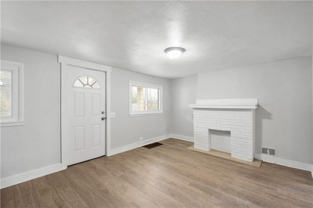 4 Gardner St, Etna, PA 15223 - entryway featuring visible vents, baseboards, and wood finished floors
