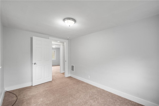 4 Gardner St, Etna, PA 15223 - spare room featuring a baseboard radiator, carpet flooring, baseboards, and visible vents