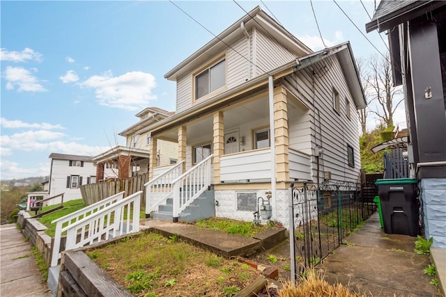 4 Gardner St, Etna, PA 15223 - view of front of house with a porch and fence