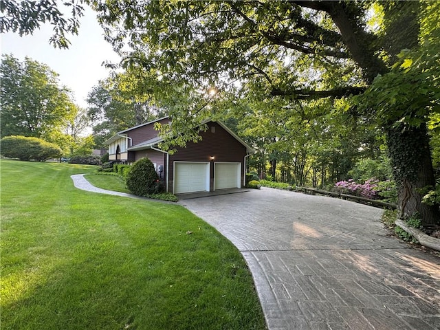 214 Mosshaven Way, Ligonier Twp, PA 15658 - view of home's exterior with concrete driveway, a yard, and a garage