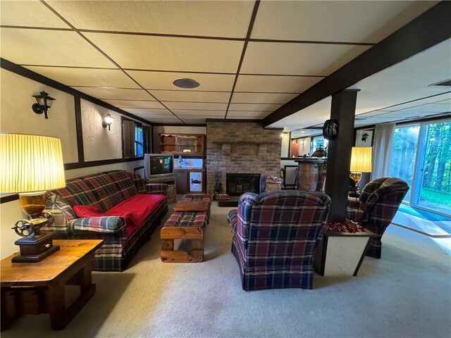 214 Mosshaven Way, Ligonier Twp, PA 15658 - carpeted living room with a brick fireplace and a drop ceiling