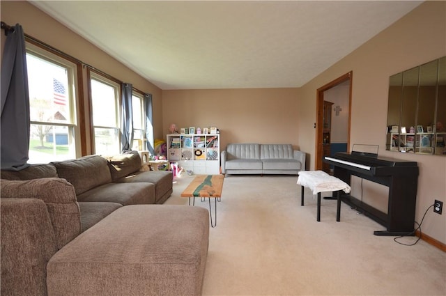 living room featuring baseboards and carpet floors