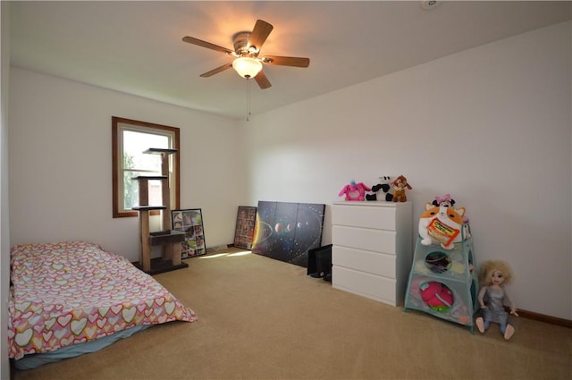 carpeted bedroom with ceiling fan