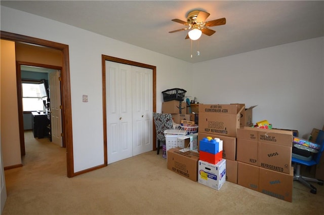 storage room with a ceiling fan