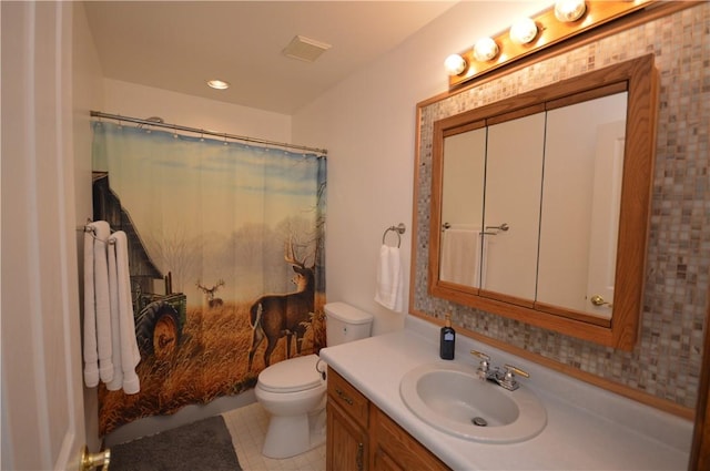 full bath featuring tile patterned floors, toilet, a shower with shower curtain, and vanity