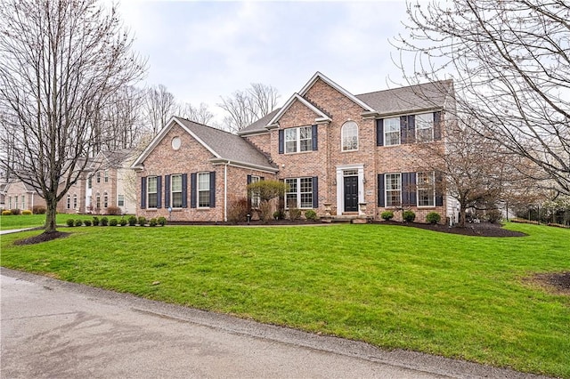 2308 Broomsage Ct, Murrysville, PA 15632 - view of front facade with brick siding and a front lawn