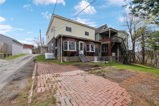 510 Brinton Ave, Pitcairn, PA 15140 - rear view of house with brick siding
