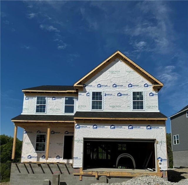 215 Creekside Dr, Chartiers City, PA 15071 - property under construction featuring an attached garage and covered porch