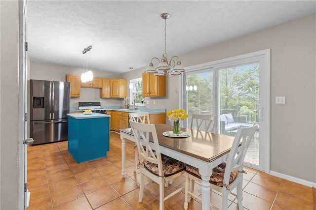 951 Castlegate Cir, Hempfield Twp, PA 15601 - dining room featuring light tile patterned flooring and a chandelier