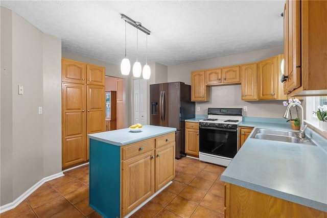 951 Castlegate Cir, Hempfield Twp, PA 15601 - kitchen with white gas range oven, stainless steel refrigerator with ice dispenser, light countertops, a kitchen island, and tile patterned floors