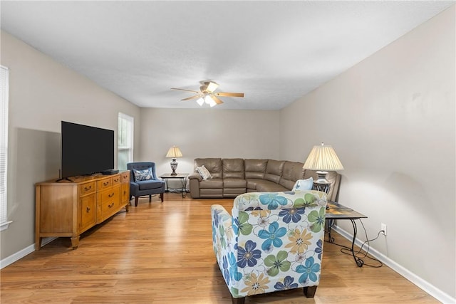951 Castlegate Cir, Hempfield Twp, PA 15601 - living area featuring a ceiling fan and light wood-style flooring