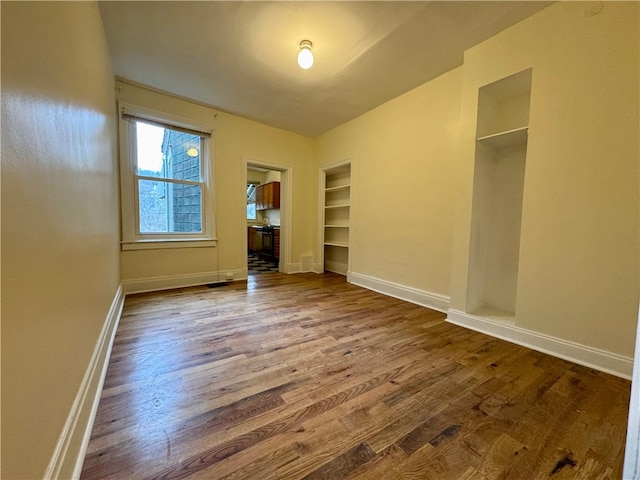 3730 Liberty Ave, Lawrenceville, PA 15201 - interior space featuring baseboards and wood finished floors
