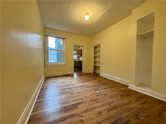 3730 Liberty Ave, Lawrenceville, PA 15201 - empty room featuring baseboards and wood finished floors
