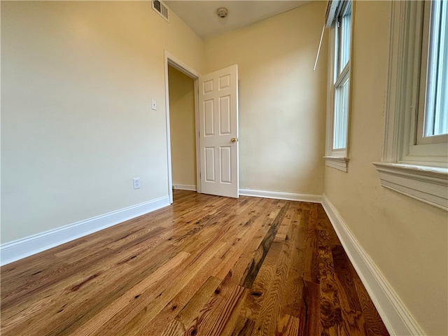 3730 Liberty Ave, Lawrenceville, PA 15201 - unfurnished room featuring visible vents, baseboards, and wood finished floors