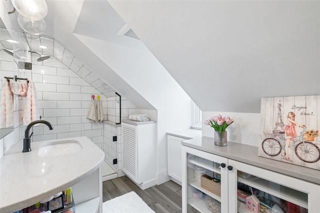6649 Kinsman Rd, Squirrel Hill, PA 15217 - full bathroom featuring a shower, wood finished floors, and a sink