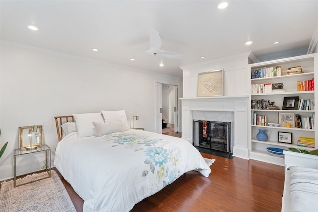 6649 Kinsman Rd, Squirrel Hill, PA 15217 - bedroom featuring dark wood-style flooring, ornamental molding, recessed lighting, and a premium fireplace