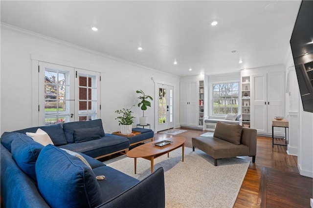 6649 Kinsman Rd, Squirrel Hill, PA 15217 - living room with crown molding, built in features, recessed lighting, and dark wood-style floors