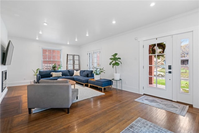 6649 Kinsman Rd, Squirrel Hill, PA 15217 - living room featuring baseboards, recessed lighting, a fireplace, crown molding, and wood-type flooring