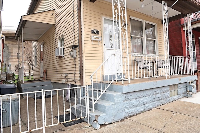 doorway to property with covered porch