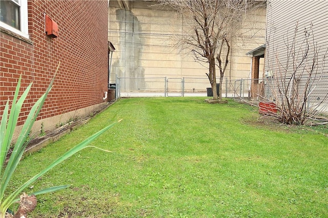 view of yard with fence
