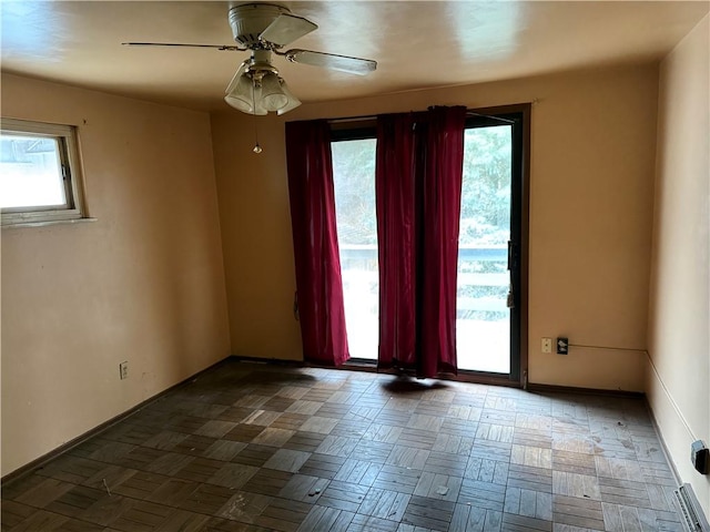 514 16th St, Beaver Falls, PA 15010 - spare room featuring healthy amount of natural light, ceiling fan, and baseboards