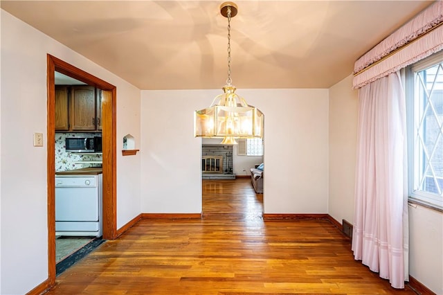 224 Churchill Rd, Wilkins Twp, PA 15145 - unfurnished dining area featuring wood finished floors and baseboards