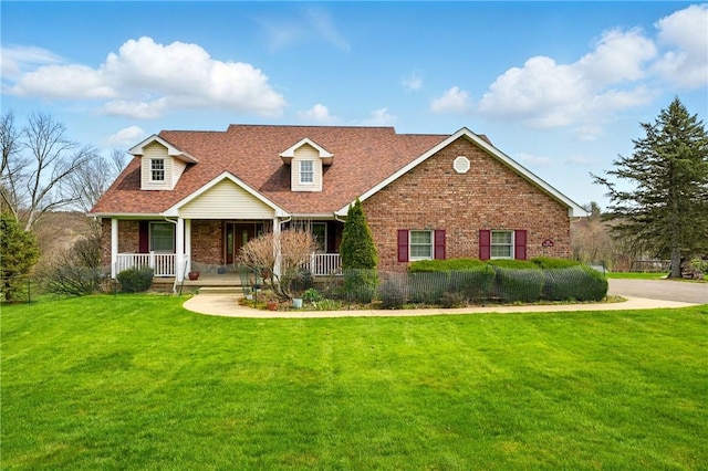 105 Hillcrest Rd, Penn Twp But, PA 16053 - view of front of home featuring brick siding, a front lawn, a porch, and roof with shingles