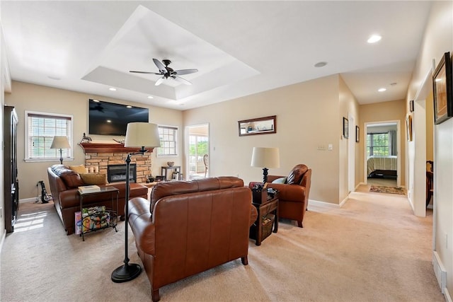 105 Hillcrest Rd, Penn Twp But, PA 16053 - living area with light carpet, healthy amount of natural light, a stone fireplace, ceiling fan, and recessed lighting