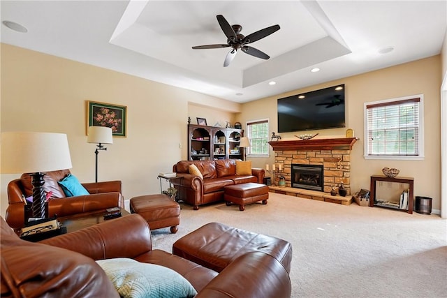 105 Hillcrest Rd, Penn Twp But, PA 16053 - carpeted living room featuring ceiling fan, a raised ceiling, recessed lighting, and a fireplace