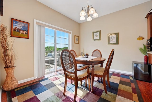 105 Hillcrest Rd, Penn Twp But, PA 16053 - dining room with a chandelier, baseboards, and wood finished floors