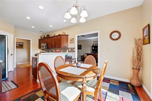 105 Hillcrest Rd, Penn Twp But, PA 16053 - dining area featuring a chandelier, wood finished floors, recessed lighting, and baseboards