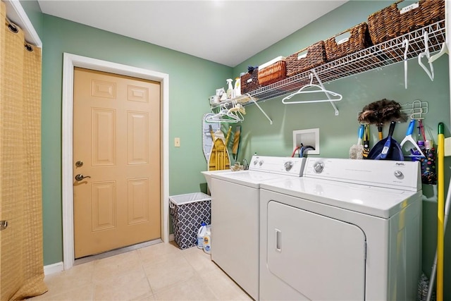 105 Hillcrest Rd, Penn Twp But, PA 16053 - laundry room featuring washing machine and dryer and light tile patterned floors