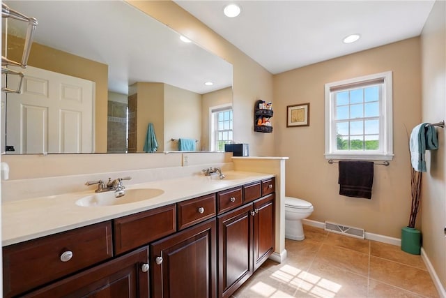 105 Hillcrest Rd, Penn Twp But, PA 16053 - full bathroom featuring double vanity, baseboards, toilet, tile patterned floors, and recessed lighting
