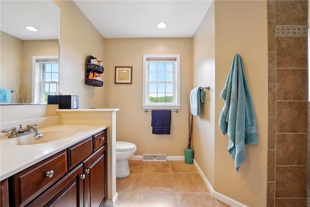 105 Hillcrest Rd, Penn Twp But, PA 16053 - bathroom with healthy amount of natural light, toilet, vanity, and baseboards