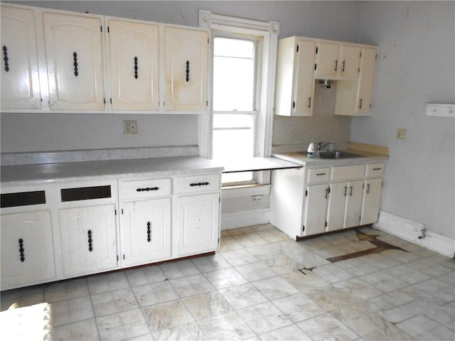 198 W Pearl St, City Of But Nw, PA 16001 - kitchen with a wealth of natural light, light countertops, and a sink