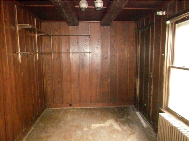 198 W Pearl St, City Of But Nw, PA 16001 - below grade area featuring hardwood / wood-style floors, radiator, and wood walls