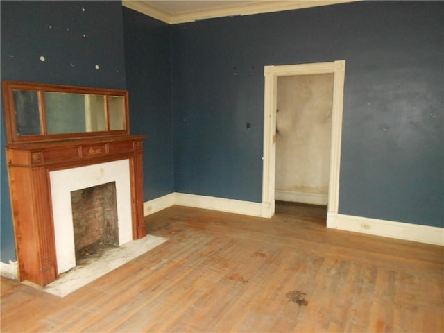 198 W Pearl St, City Of But Nw, PA 16001 - unfurnished living room with a fireplace with flush hearth, wood finished floors, baseboards, and ornamental molding