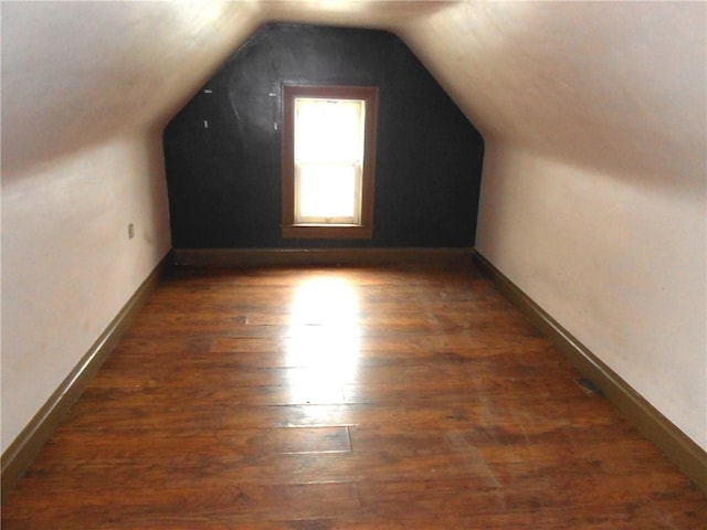 198 W Pearl St, City Of But Nw, PA 16001 - additional living space with baseboards, lofted ceiling, and hardwood / wood-style flooring