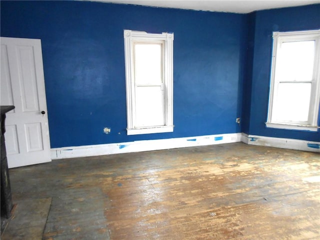 198 W Pearl St, City Of But Nw, PA 16001 - spare room featuring wood-type flooring and baseboards