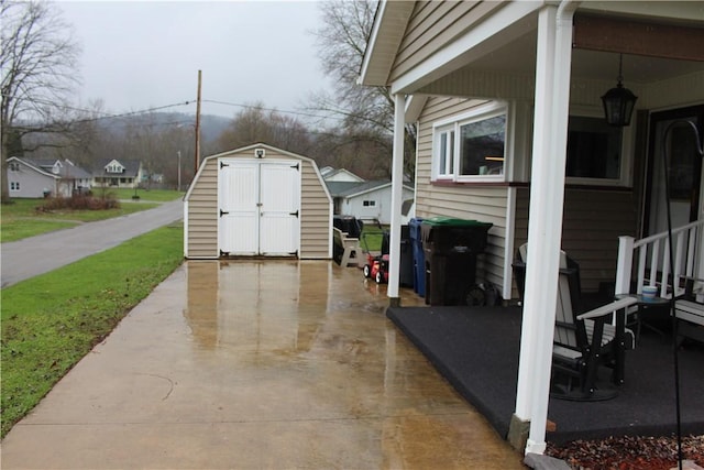 192 S Franklin, St, PA 16314 - view of patio featuring a shed and an outbuilding